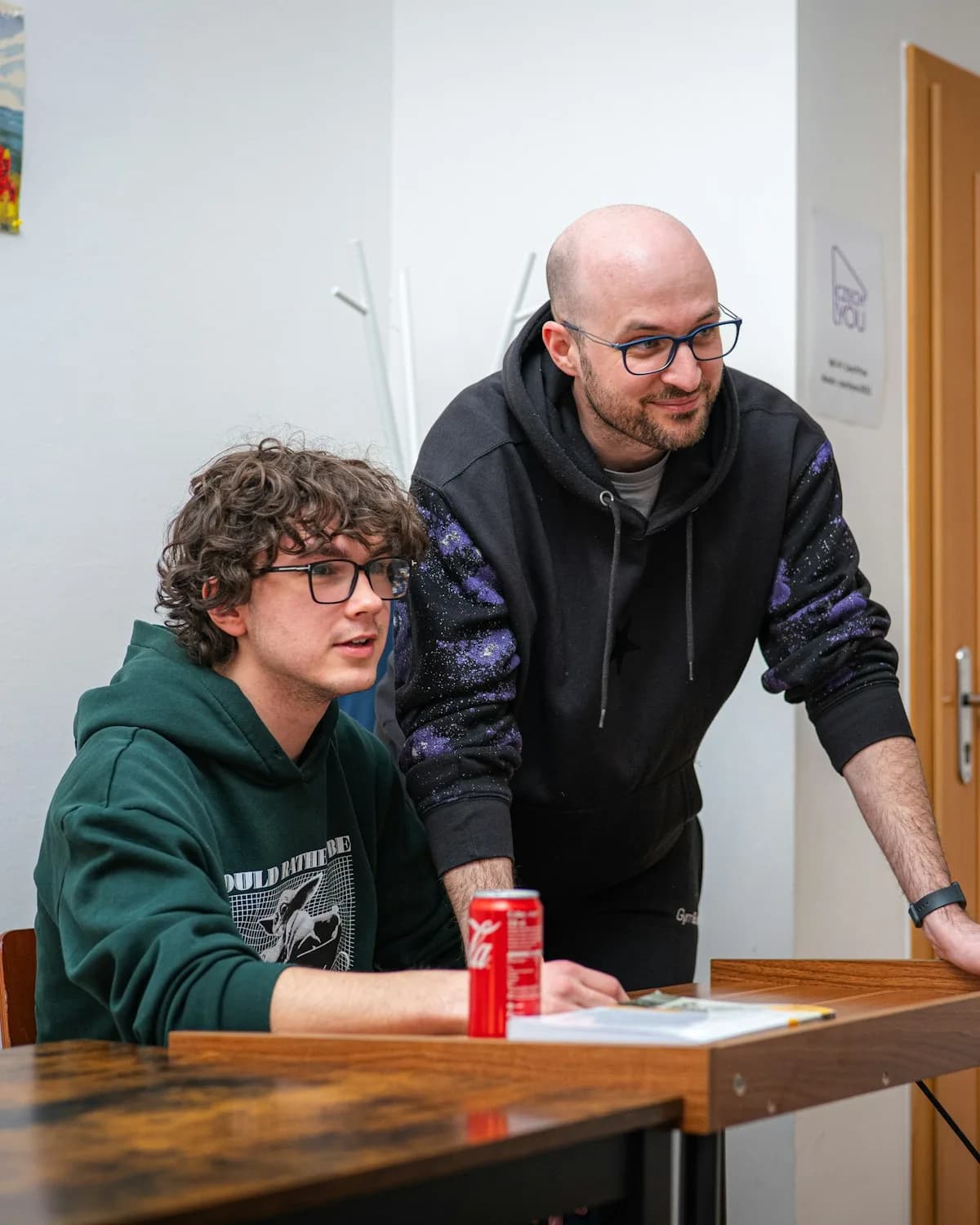 A teacher working one to one with a teenage student